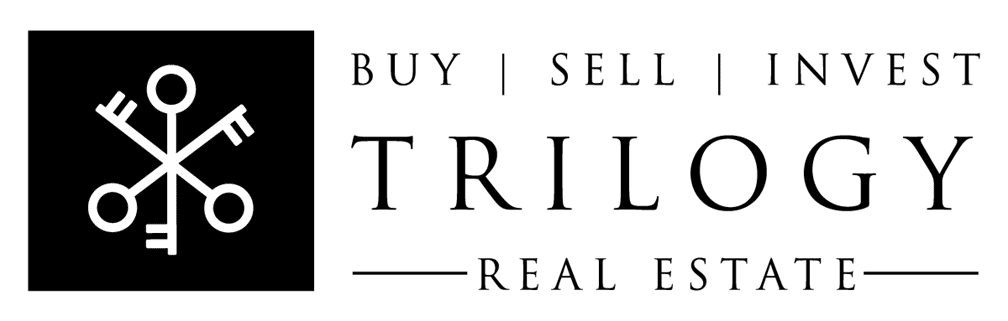 Trilogy Real Estate Logo